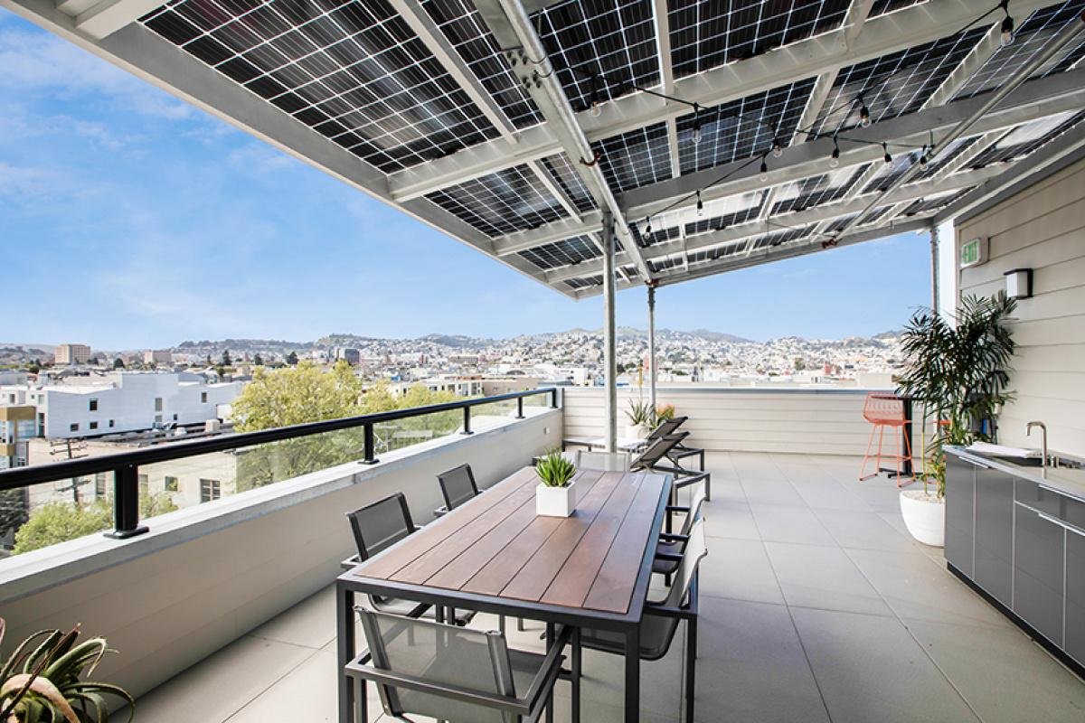 Integrated leak-proof solar rooftop canopy covering a home terrace